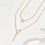 Thumbnail: Stylish Gold Color Y-Shaped Design Layered Double Chain with Rhinestone Pendant