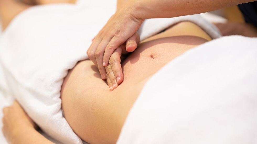 Gentle pressure on the abdomen for belly massage