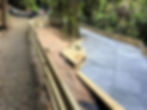 Completed retaining and concrete works following slip remediation at Kauri Loop Road, Oratia