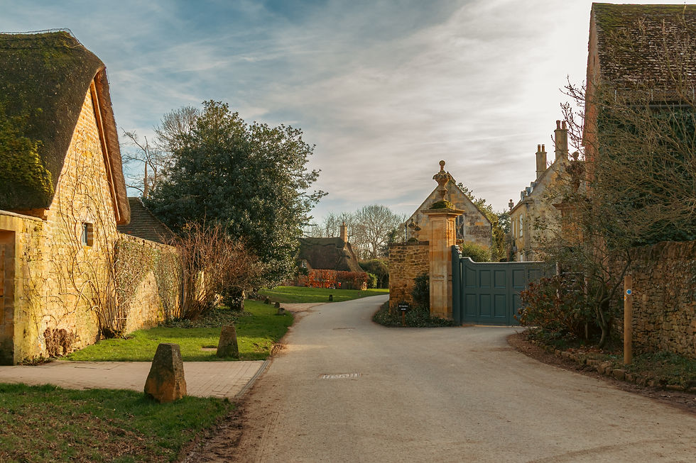 A view of the entrance to Hidcote Manor and village cottages