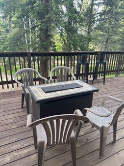 Fire Pit with four chairs on the deck