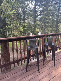 High chairs by deck railing