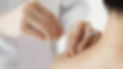Human shoulder with acupuncture needles