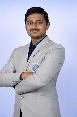 Smiling man in blazer with arms crossed