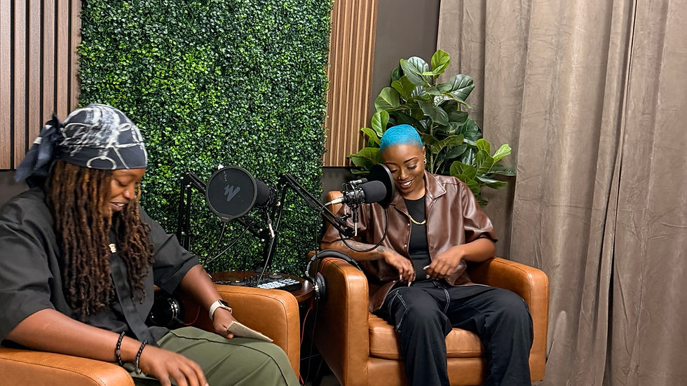 Two people recording in the Brewed Up Echo Yard podcast studio