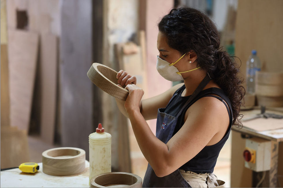 Duplo design mx_Female business owner wood-working in workshop