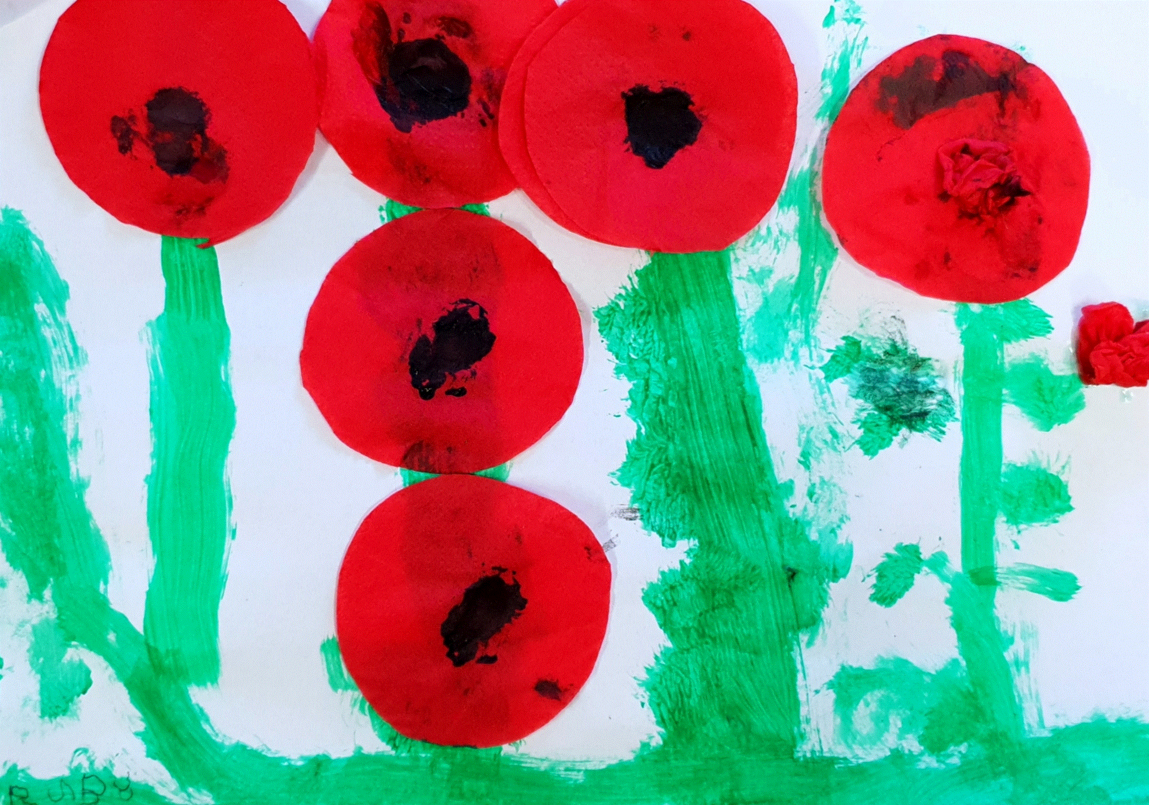 The children created their own poppy pictures