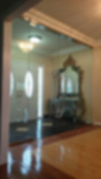 Glass walls and doors in front entry way of home