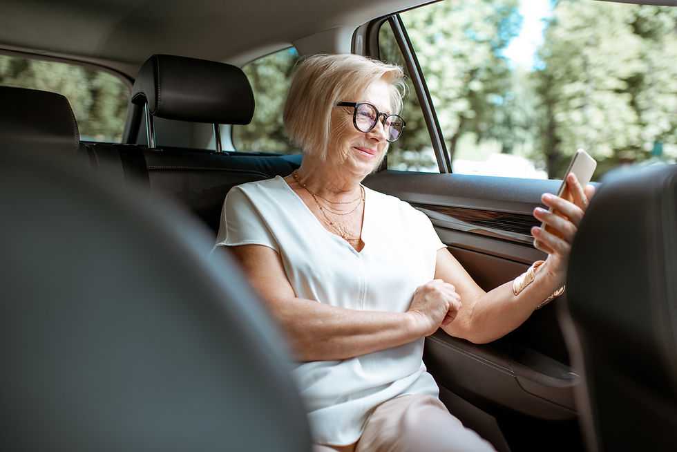 senior-woman-using-mobile-device-in-car-2026-01-08-08-00-20-utc.jpg