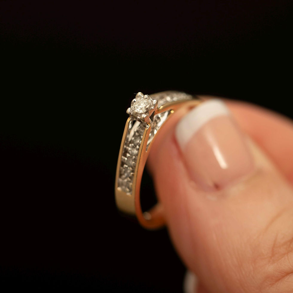 Thumbnail: Vintage gold diamond ring from angled side view