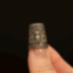 Vintage sterling silver owl thimble with ornate scrollwork detail