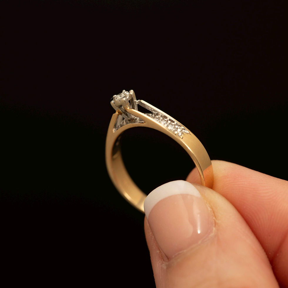 Thumbnail: Vintage diamond ring showing cathedral-style setting