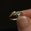 Thumbnail: Vintage 10k Gold Emerald & Diamond Petite Bypass Ring