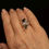 Thumbnail: Vintage 10k Gold Sapphire Bypass Ring with CZ Baguettes – Size 6.75