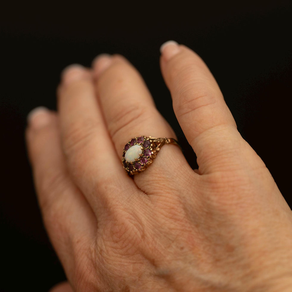Thumbnail: Close up of opal and ruby cluster design