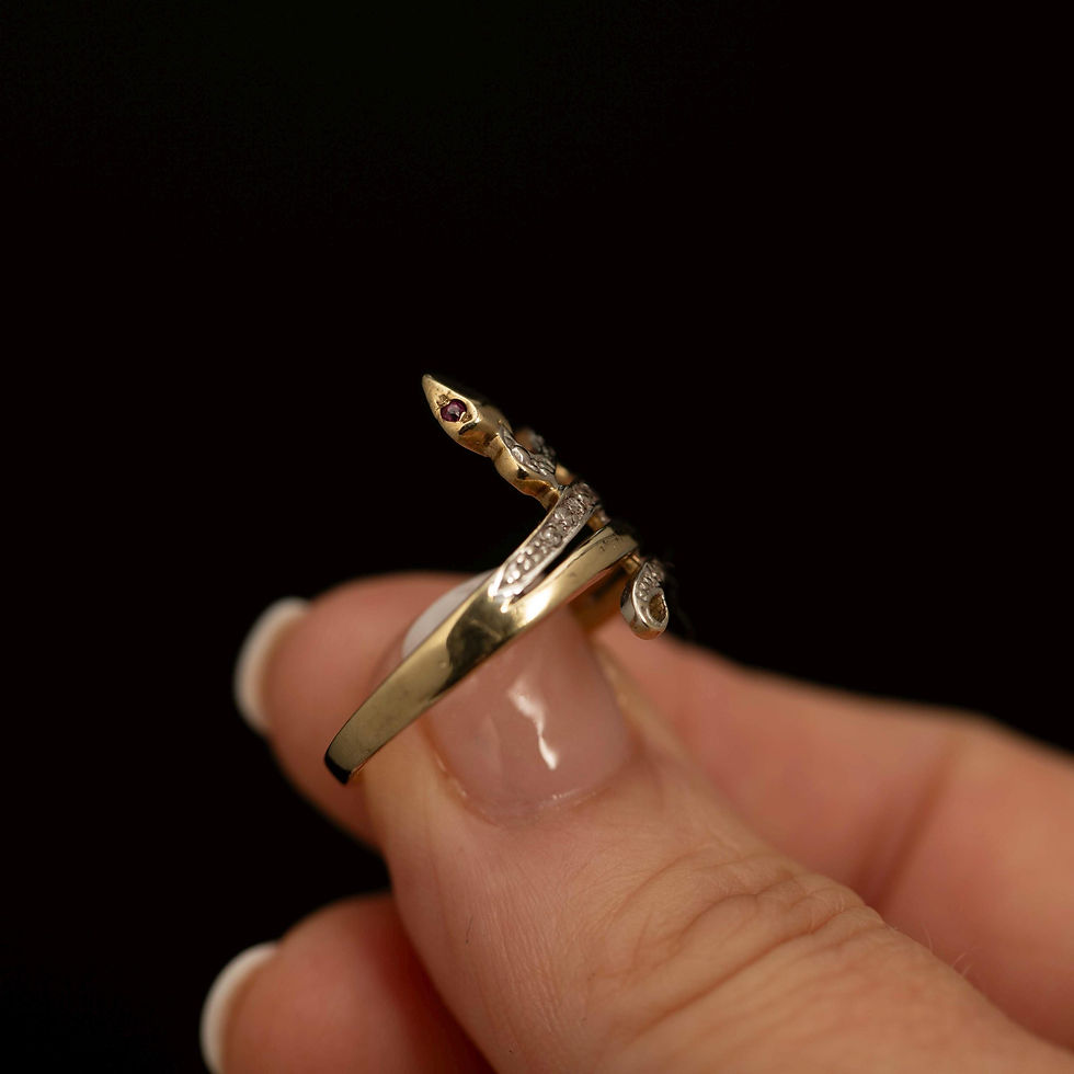 Thumbnail: Angled profile highlighting the diamond-set serpent body.
