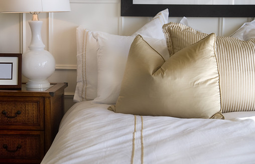 Hotel bed white and gold