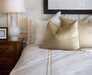 Hotel bed white and gold