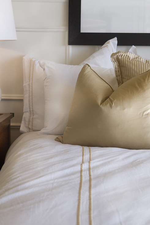 Hotel bed white and gold