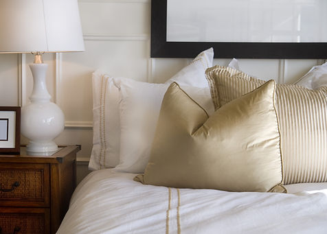 Hotel bed white and gold