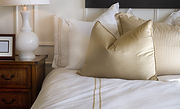 Hotel bed white and gold