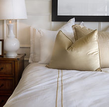 Hotel bed white and gold