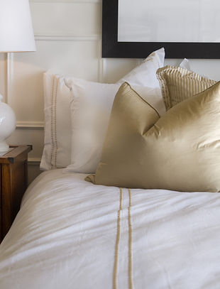 Hotel bed white and gold