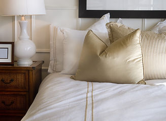 Hotel bed white and gold