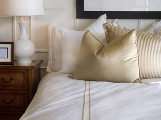 Hotel bed white and gold