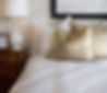 Hotel bed white and gold