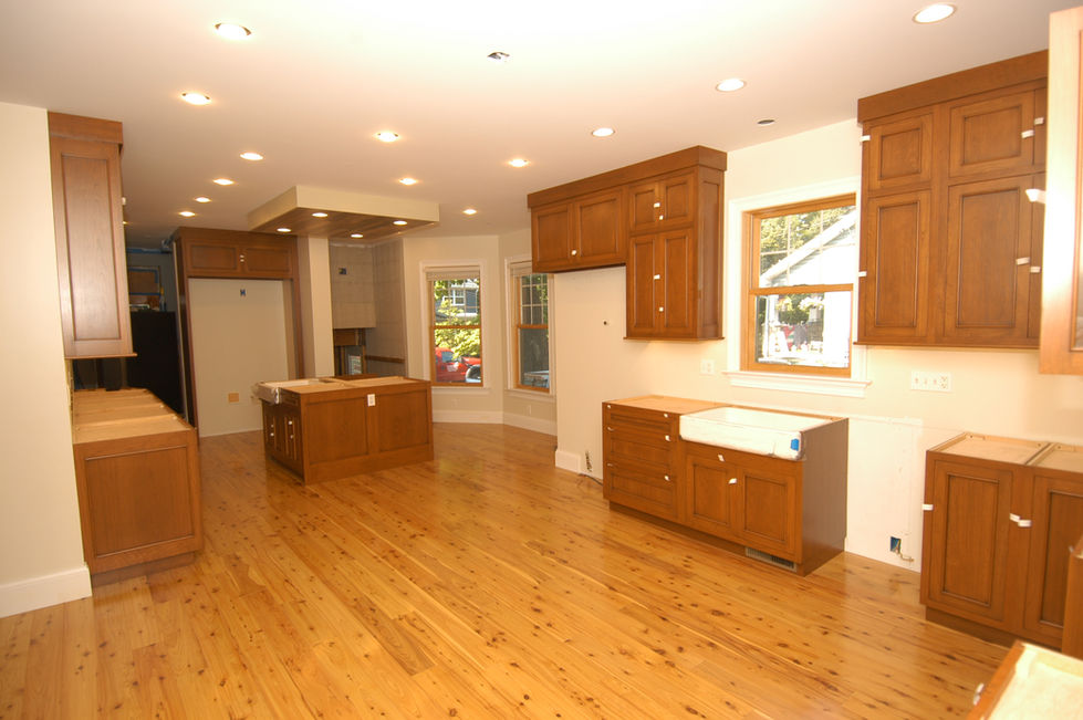 Large open concept kitchen featuring custom cabinetry for a 48-inch Viking refrigerator