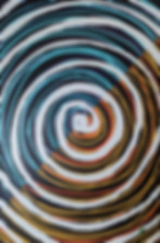 A gray, blue, orange, and black swirly painting. The parts that swirly in blue and black and the part that swirls in black and orange are split triangularly. The bottom triangle has gray, black, and orange. The top one has gray, black, and blue.