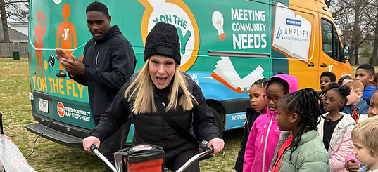 Amber Huett-Garcia with students from White Haven Middle School and Y On the Fly