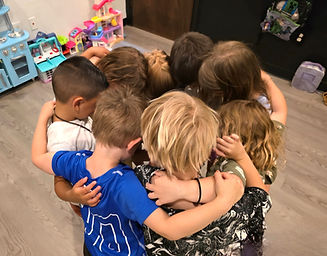 PrayerHuddle_edited.jpg