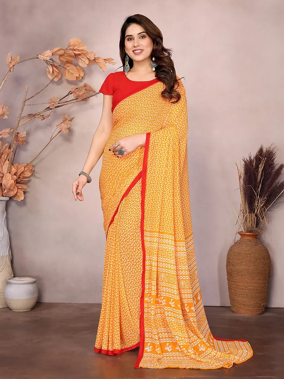 Thumbnail: Elegant Yellow Printed Georgette Saree with Red Border and Matching Blouse