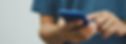 vecteezy_man-in-a-blue-shirt-is-pressing-a-mobile-phone-on_5342244_438_edited_edited.jpg