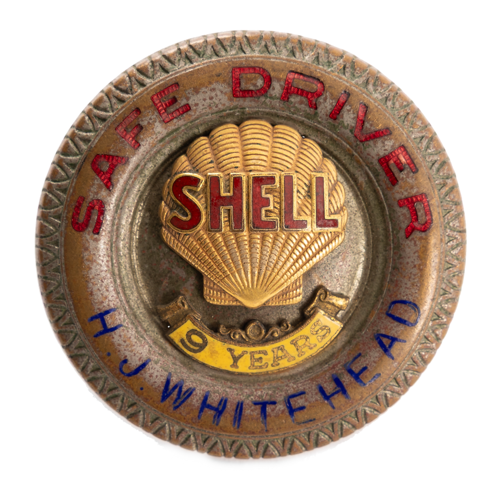 antique-shell-oil-safe-driver-9-years-service-badg_edited_edited.png
