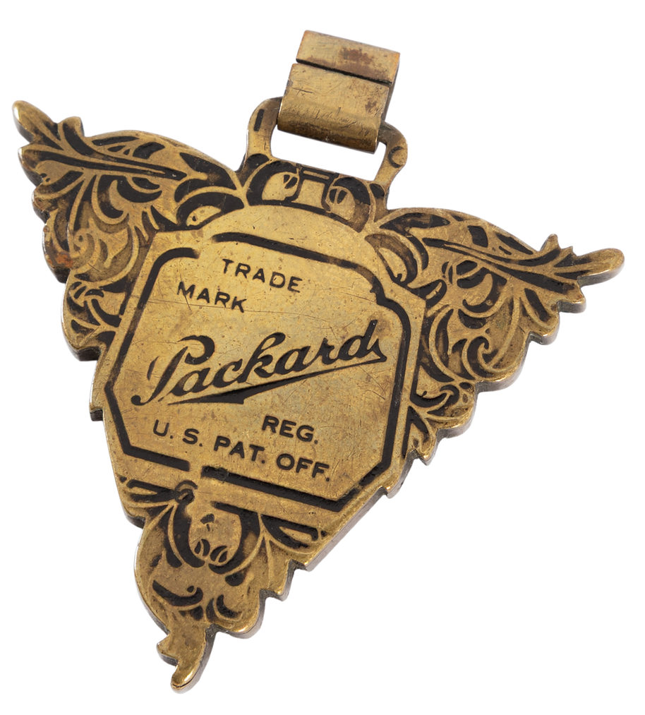 antique-packard-tires-brass-fob-detailed-side_edited.png