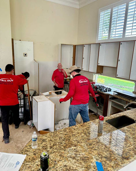 All Out Demolition team removing a kitchen at an upscale residence