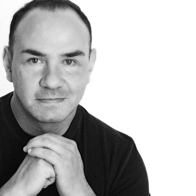 Carlos Polo headshot, black and white