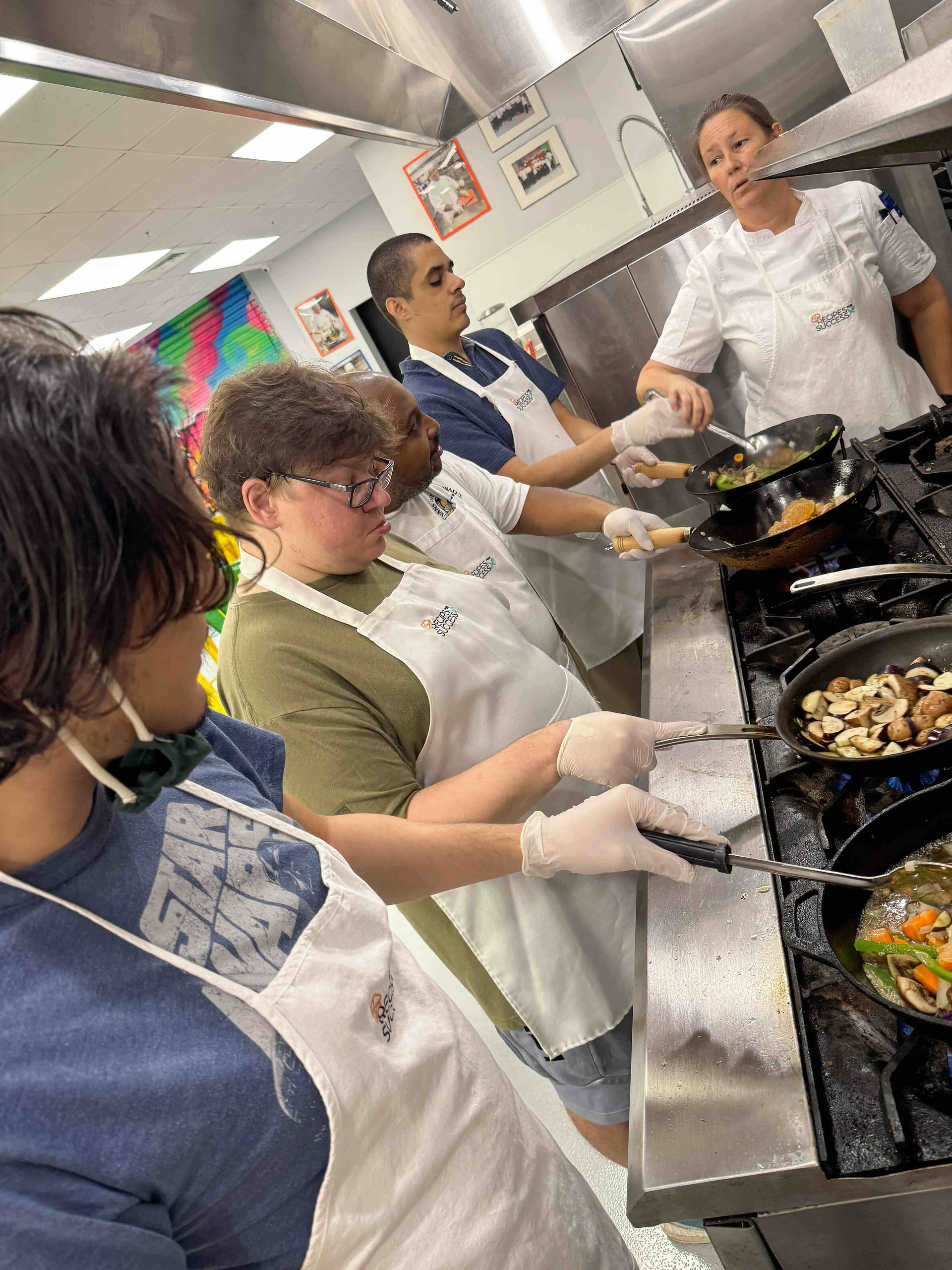Connections adults learning how to sauté healthy veggies 