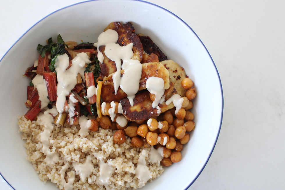 Hot honey-glazed halloumi with farro, rainbow chard, crispy chickpeas, and whipped tahini—a colorful, seasonal vegetarian meal prep dish from Crewneck Chef in Raleigh.
