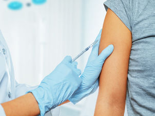 a nurse giving a vaccination