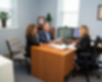 Scott Elwell and colleagues in the office