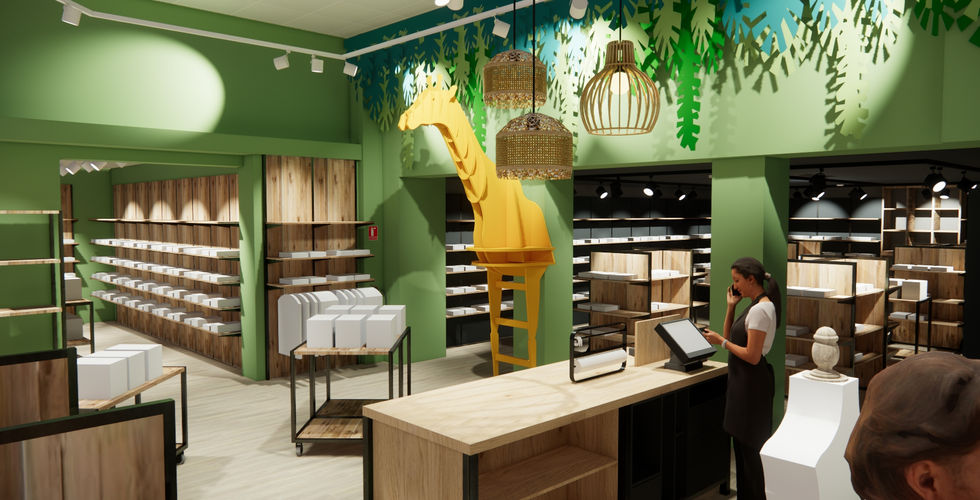 Interior shop with giraffe decor displays, cashier, and wooden shelves; green walls.