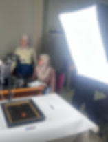 Team members digitising a historic object as part of the Indonesian Museums Documentation Project.