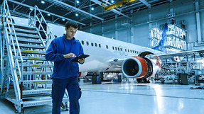 Aircraft maintenance mechanic in blue un