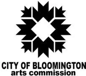 Logo for The City of Bloomington Arts Commission. It has a white diamond in the middle with crown-like shapes surrounding it.