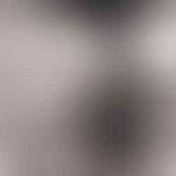 Abstract art of a cracked wall with lightning bolts overhead background TYRONEGETER.COM