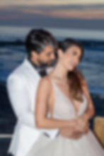 wedding-couple-embrace-beach-twilight.jpg
